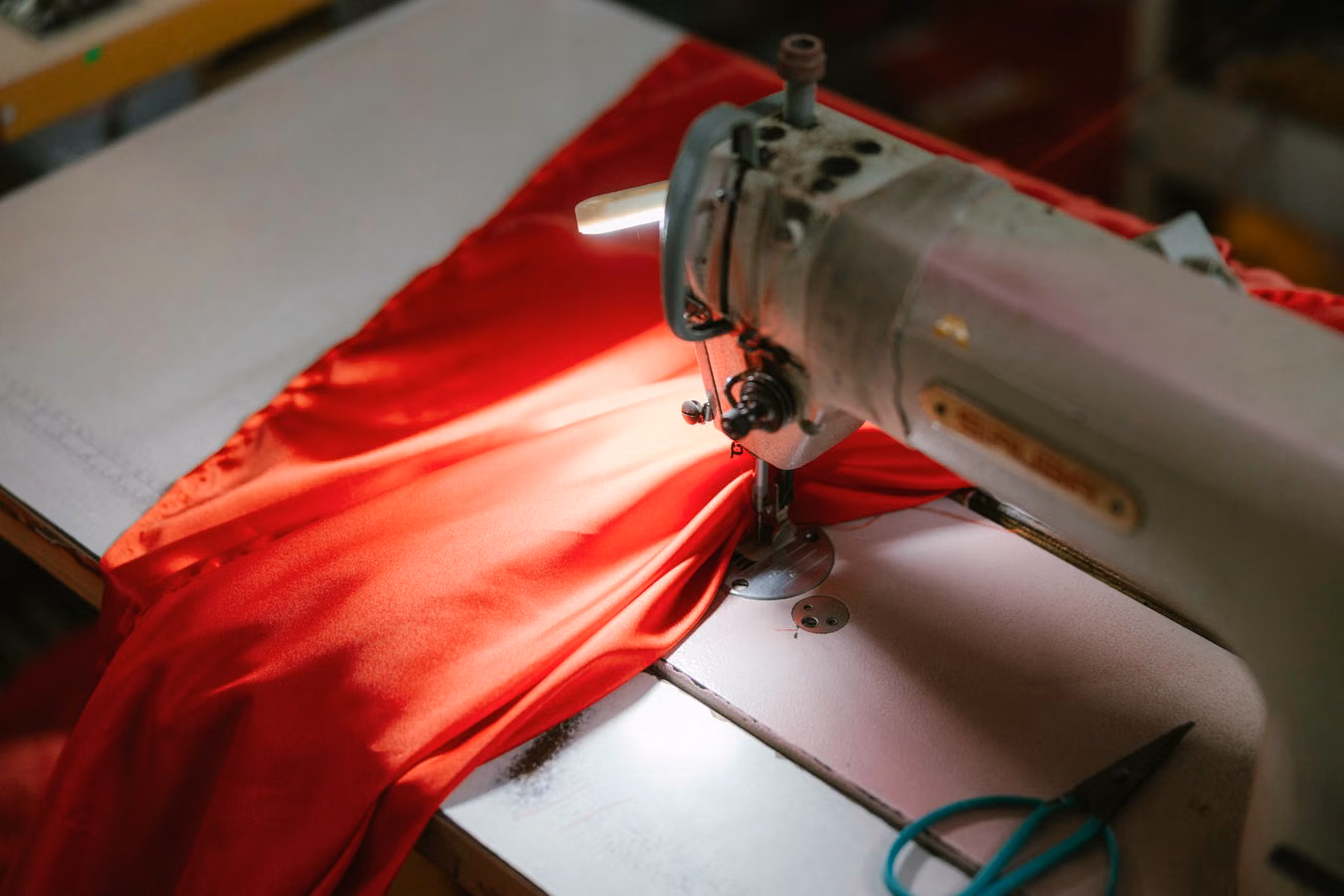 Cover manufacturer Cape Town – machinist sewing a marine canvas cover
